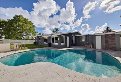 Photo of 1700 NW 28 Avenue, Fort Lauderdale, FL 33311 (MLS # RX-11122898)