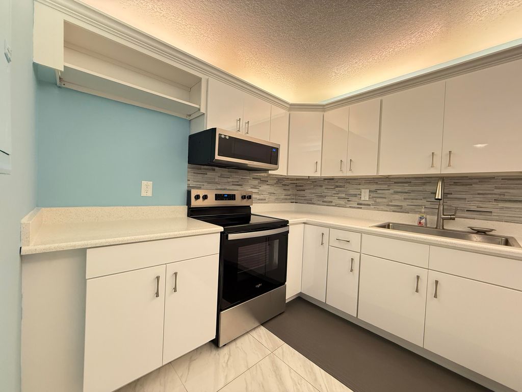 Photo of 950 S Kanner Highway E #E23, Stuart, FL 34994 (MLS # RX-11128609)