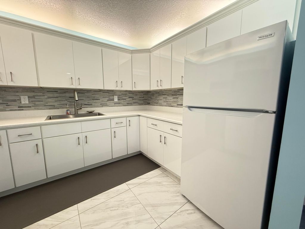 Photo of 950 S Kanner Highway E #E23, Stuart, FL 34994 (MLS # RX-11128609)