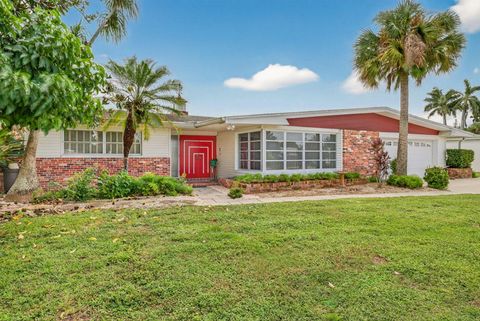 Photo of 406 Leeland Heights Boulevard E, Lehigh Acres, FL 33936 (MLS # RX-11125471)