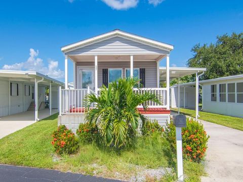 Photo of 121 Sandhill Boulevard, Fort Pierce, FL 34982 (MLS # RX-11128248)