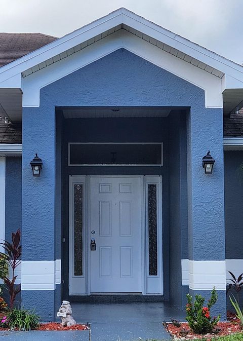 Photo of 2518 SW Cooper Lane, Port Saint Lucie, FL 34984 (MLS # RX-11129657)