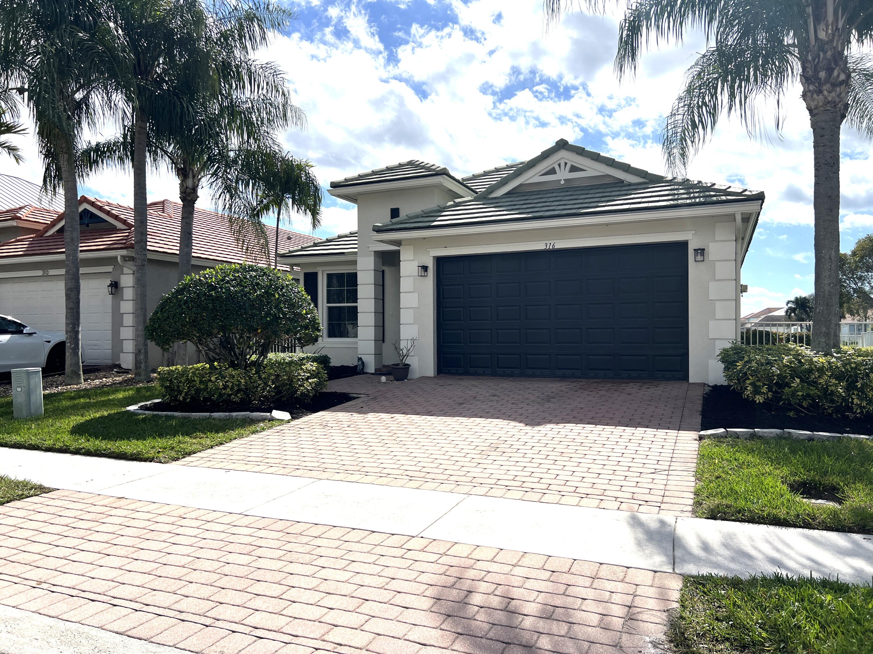 316 Mulberry Grove Road, Royal Palm Beach, Palm Beach County, Florida - 3 Bedrooms  
2 Bathrooms - 