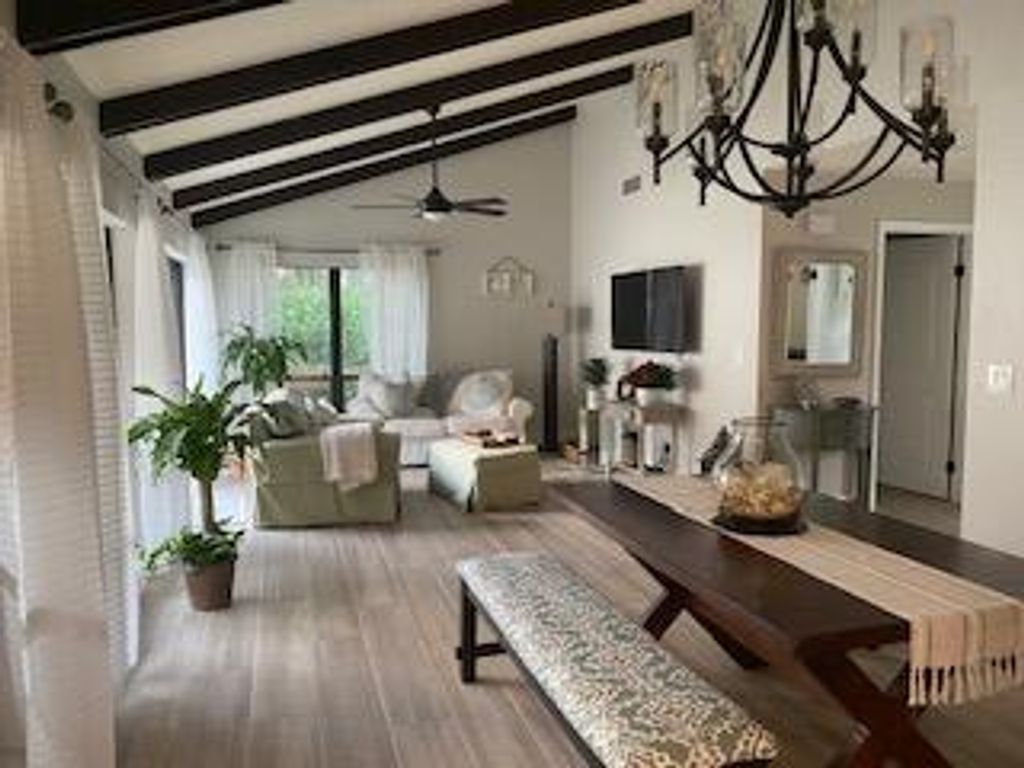 Photo of 4 Ironwood Way N, Palm Beach Gardens, FL 33418 (MLS # RX-10838309)