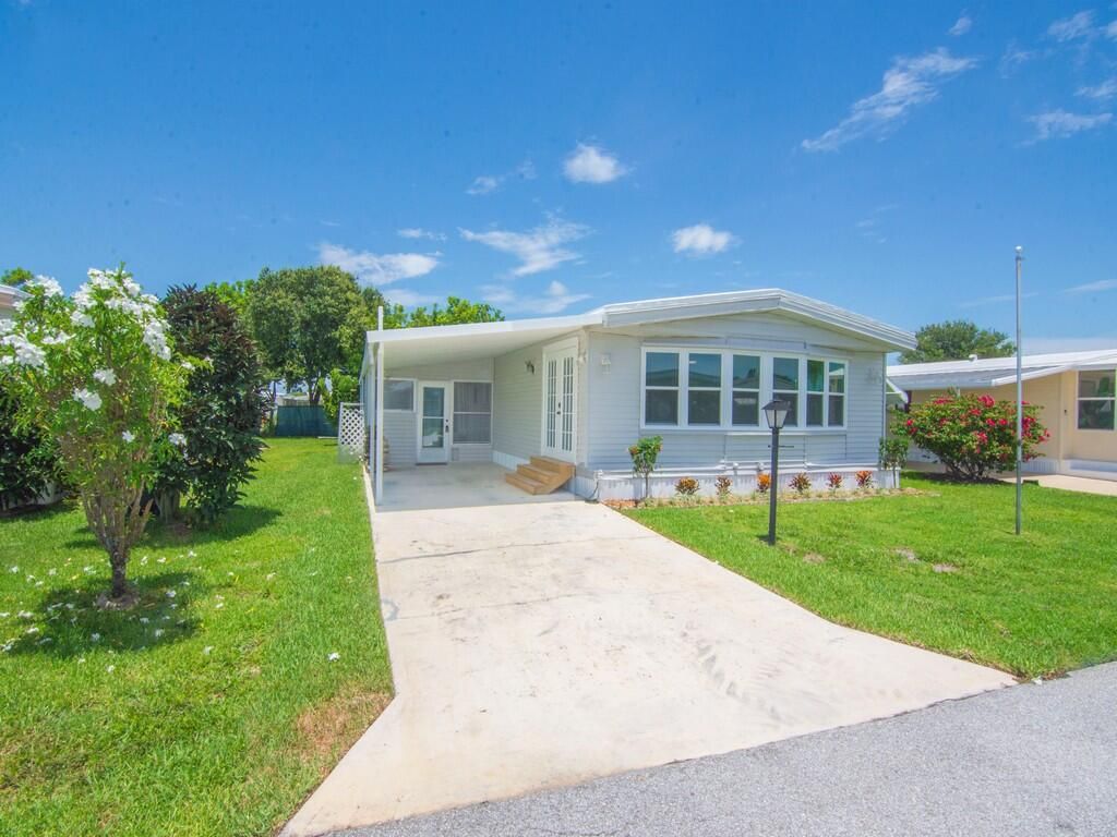 Photo of 179 NE Emerald Drive, Jensen Beach, FL 34957 (MLS # RX-11103064)