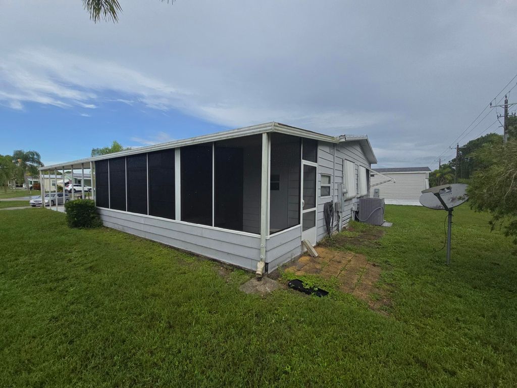Photo of 11 Buenos Aires, Fort Pierce, FL 34951 (MLS # RX-11115475)
