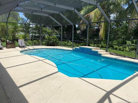 Photo of 94 NE Elderberry Terrace, Jensen Beach, FL 34957 (MLS # RX-11106650)