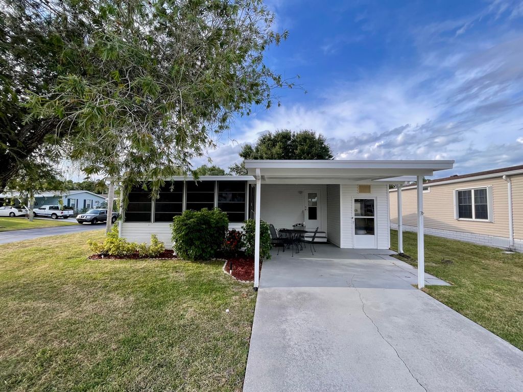 Photo of 334 Seahorse Terrace, Fort Pierce, FL 34982 (MLS # RX-11084596)