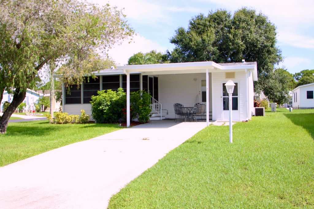 Photo of 334 Seahorse Terrace, Fort Pierce, FL 34982 (MLS # RX-11084596)