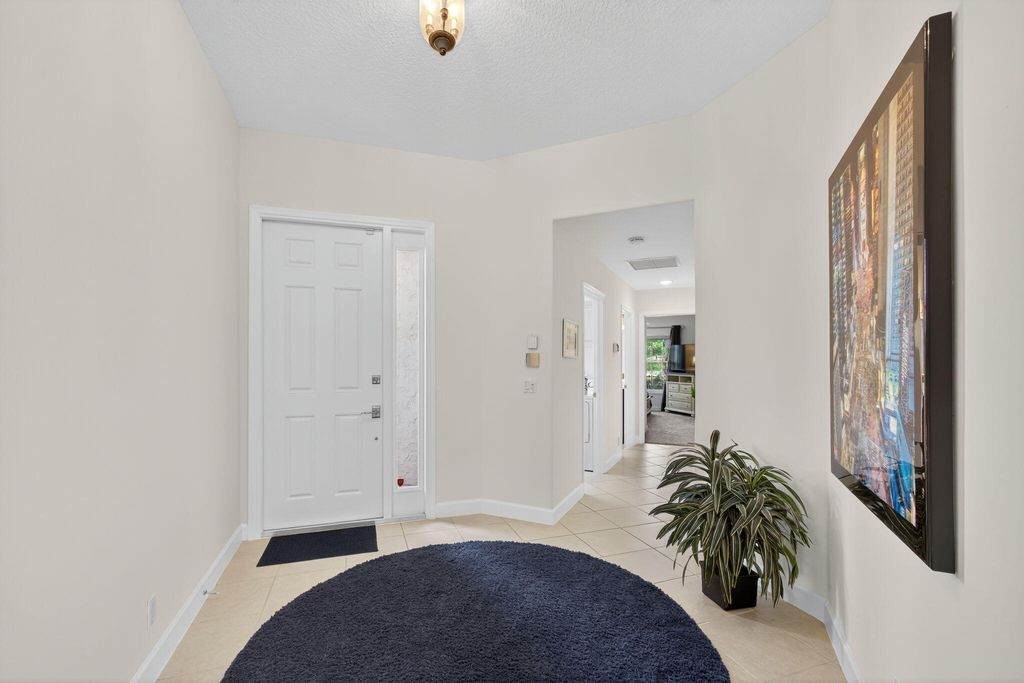 Photo of 902 Augusta Pointe Drive, Palm Beach Gardens, FL 33418 (MLS # RX-11118944)