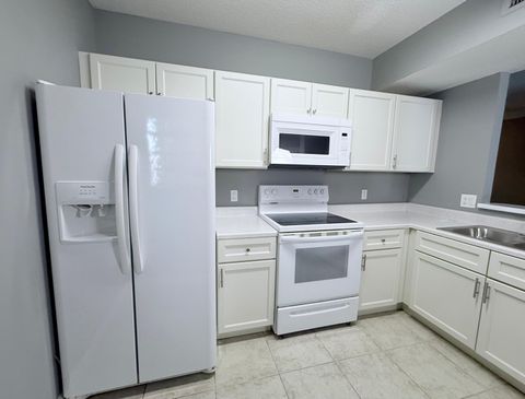 Photo of 1115 Golden Lakes Boulevard #512, West Palm Beach, FL 33411 (MLS # RX-11128903)