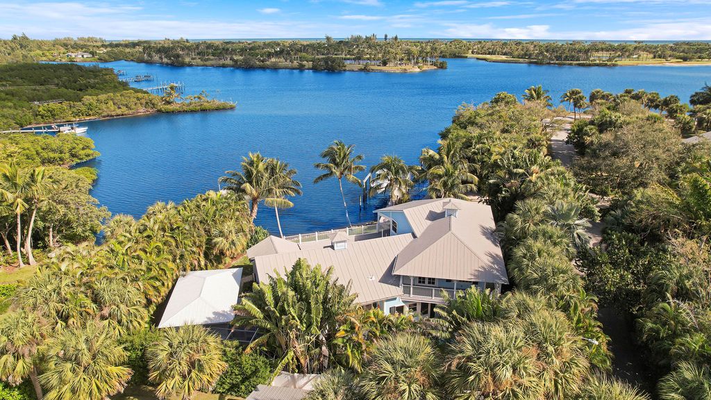 Photo of 11909 SE Indian River Drive, Hobe Sound, FL 33455 (MLS # RX-11050683)