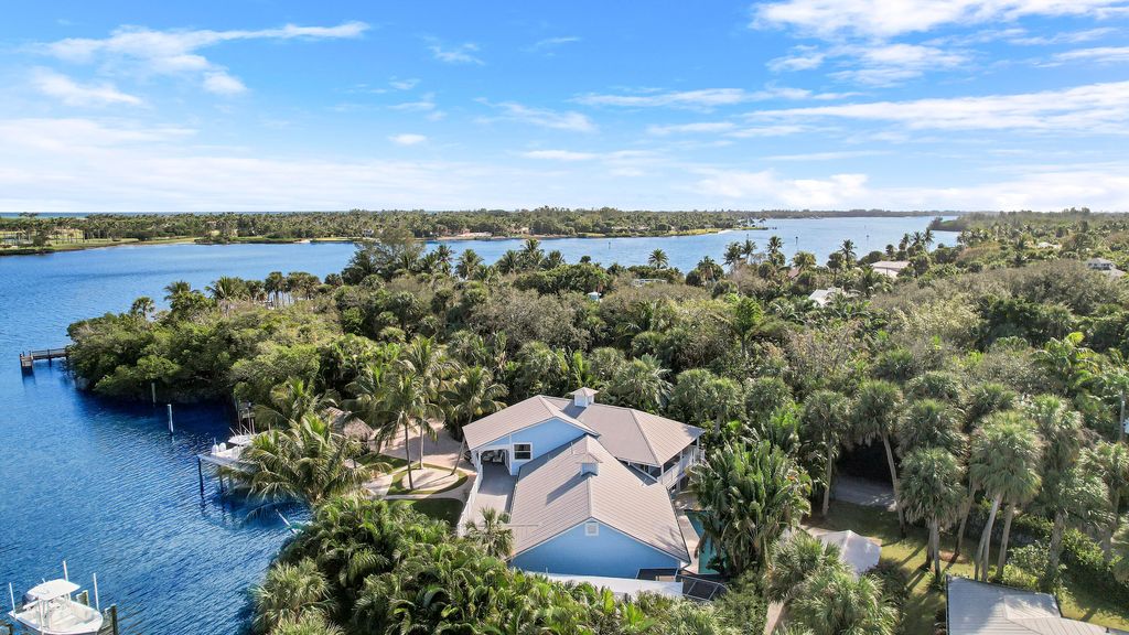 Photo of 11909 SE Indian River Drive, Hobe Sound, FL 33455 (MLS # RX-11050683)