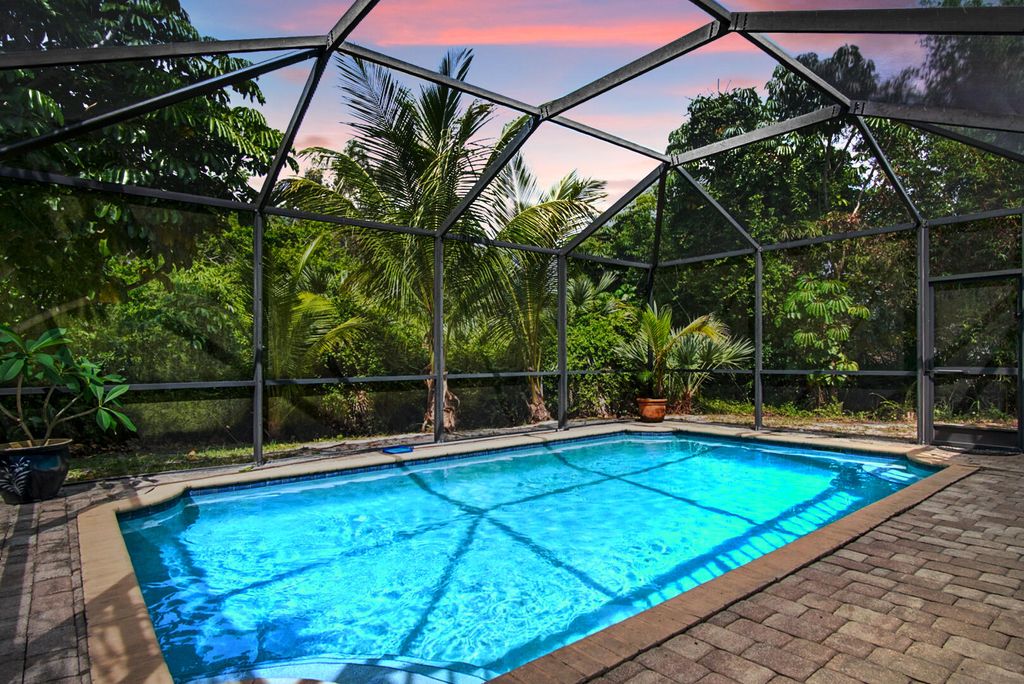 Photo of 880 NE Stokes Terrace, Jensen Beach, FL 34957 (MLS # RX-11094580)