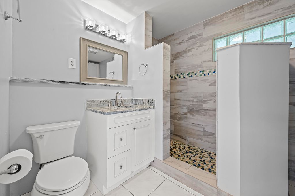 Photo of 872 SW 30th Street, Palm City, FL 34990 (MLS # RX-11128111)