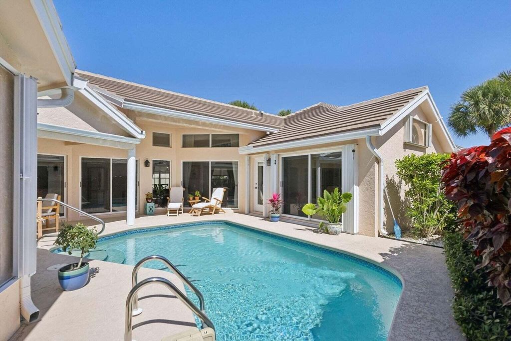 Photo of 16481 Riverwind Court, Jupiter, FL 33477 (MLS # RX-11090471)