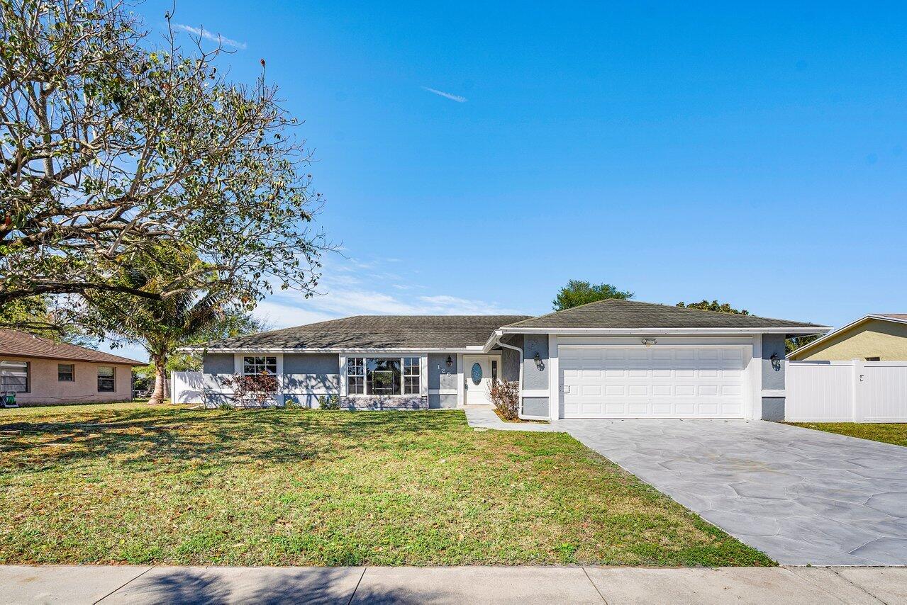 Property for Sale at 126 La Mancha Avenue, Royal Palm Beach, Palm Beach County, Florida - Bedrooms: 3 
Bathrooms: 2  - $619,000
