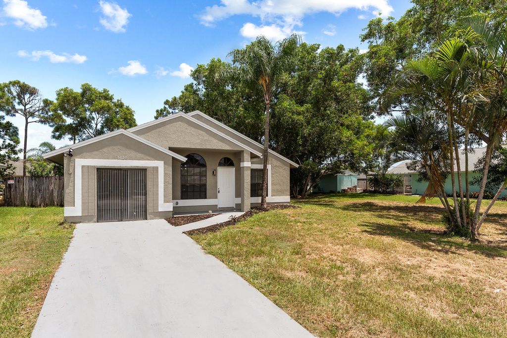 Photo of 5629 SE Collins Avenue, Stuart, FL 34997 (MLS # RX-11113259)