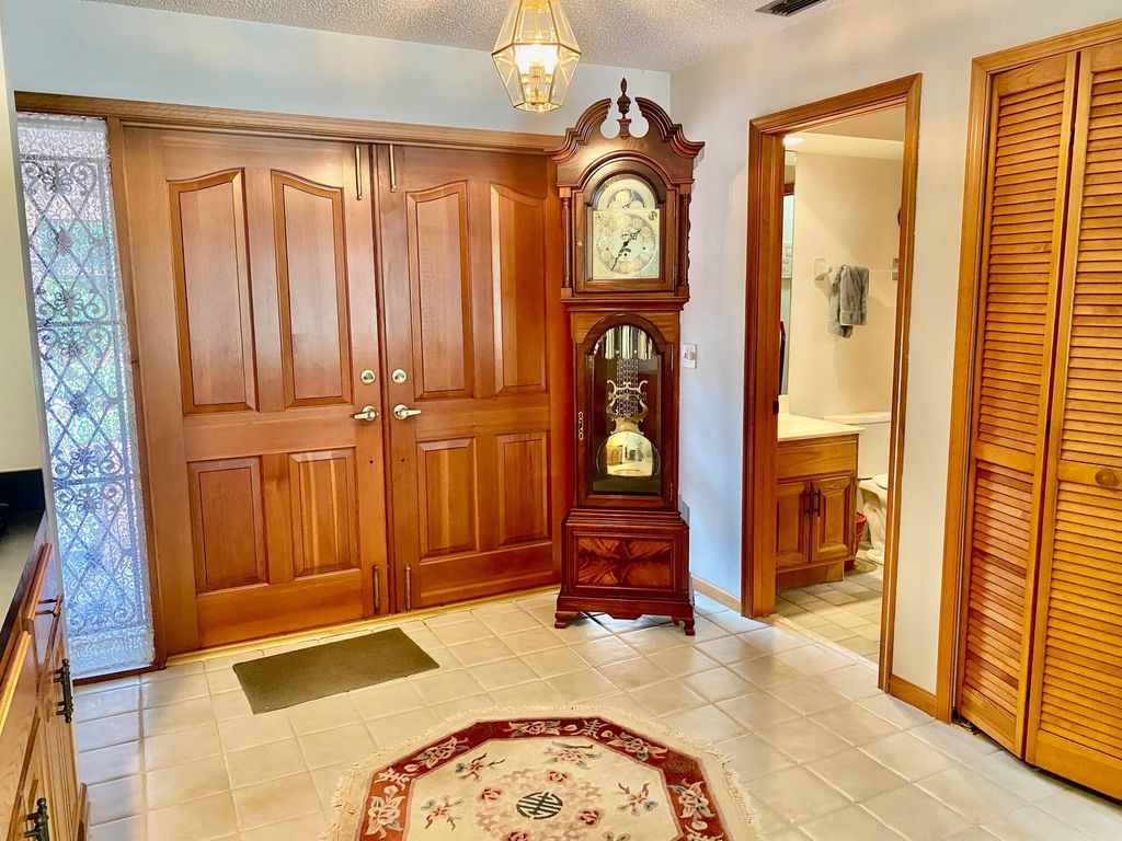 Photo of 12 Kintyre Road, Palm Beach Gardens, FL 33418 (MLS # RX-10909077)