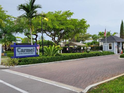 Photo of 905 NE 199th Street #105, Miami, FL 33179 (MLS # RX-11104971)