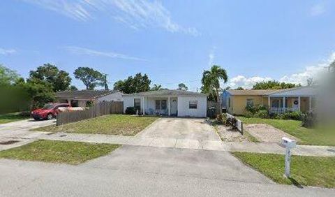 Photo of 210 NW 52 Court, Fort Lauderdale, FL 33309 (MLS # RX-11125438)