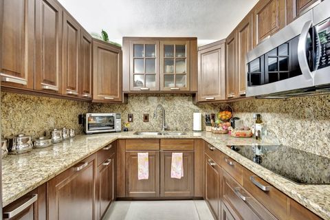 Photo of 1605 SW Silver Pine Way #110-D1, Palm City, FL 34990 (MLS # RX-11078968)