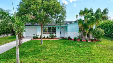 Photo of 3837 NE Melba Drive, Jensen Beach, FL 34957 (MLS # RX-11128657)