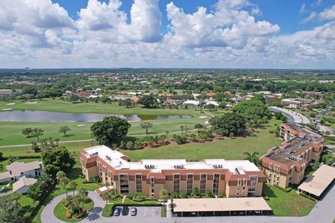 Photo of 5350 Woodland Lakes Drive #111, Palm Beach Gardens, FL 33418 (MLS # RX-11118879)