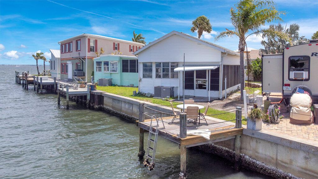 Photo of 1135 Nettles Boulevard, Jensen Beach, FL 34957 (MLS # RX-11099327)