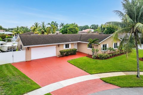 Photo of 1540 SW 56th Avenue, Plantation, FL 33317 (MLS # RX-11104567)