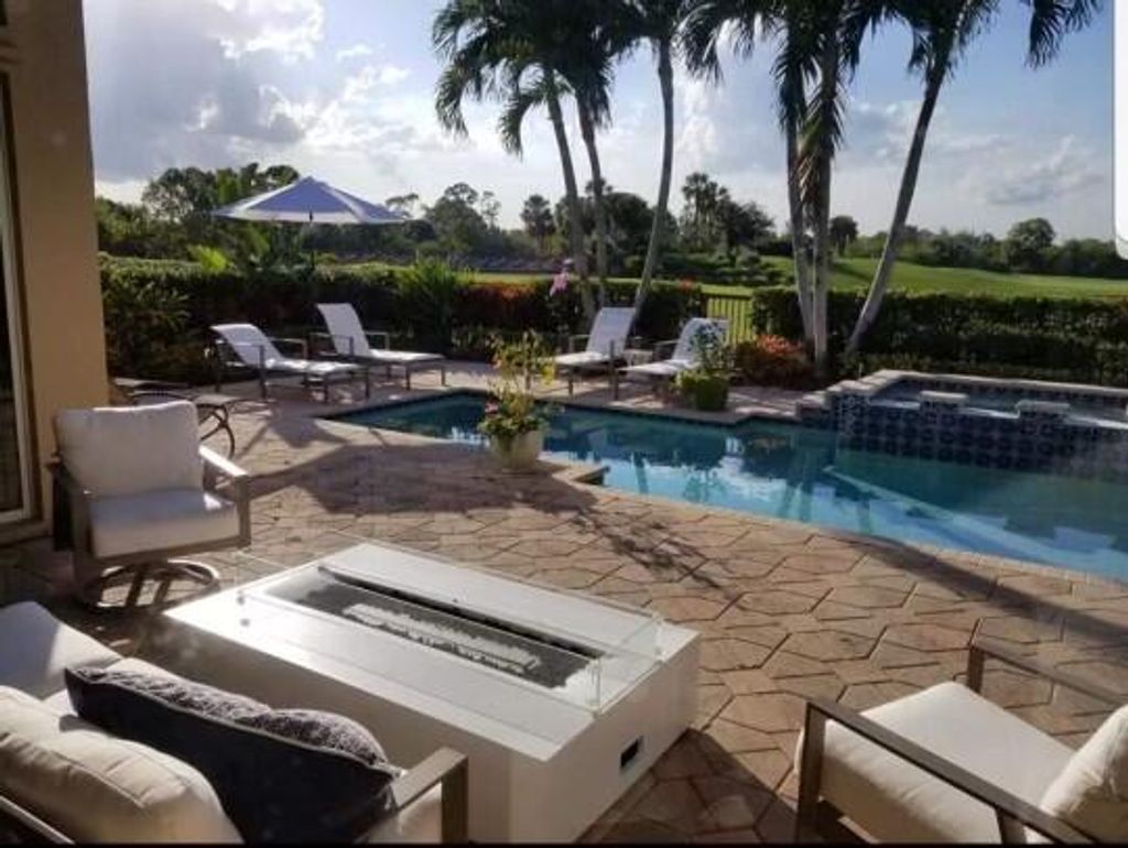 Photo of 263 Isle Way, Palm Beach Gardens, FL 33418 (MLS # RX-10777685)