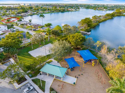 Tiny photo for 1741 NW 39th Street, Oakland Park, FL 33309 (MLS # RX-11110463)