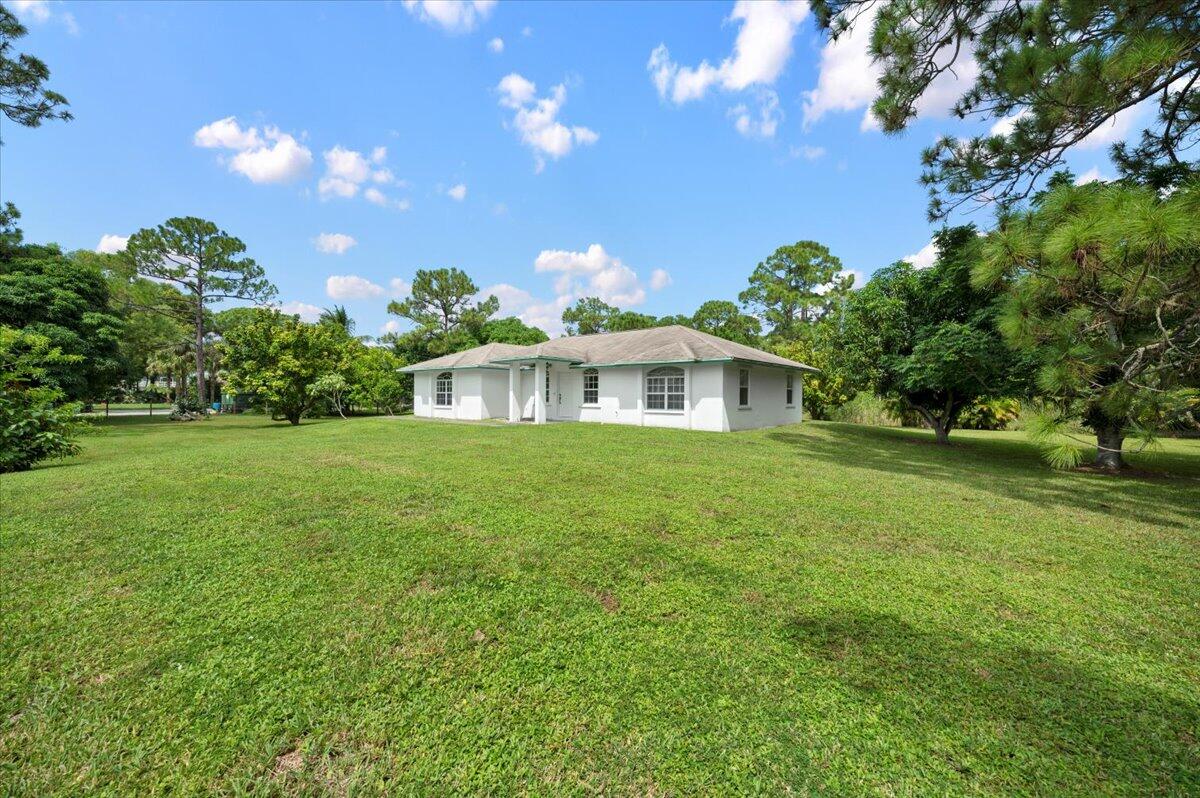 Property for Sale at 18837 92nd Lane, The Acreage, Palm Beach County, Florida - Bedrooms: 3 
Bathrooms: 2  - $539,000