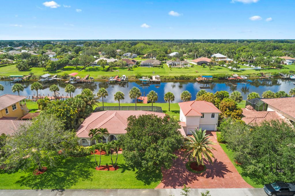 Photo of 2616 SW River Shore Drive, Port Saint Lucie, FL 34984 (MLS # RX-10806630)