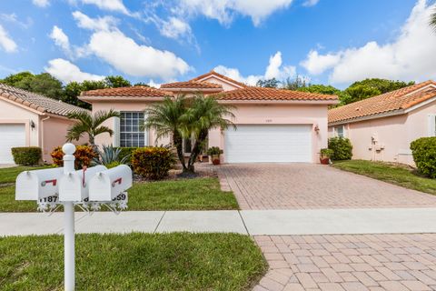 Photo of 11859 Grove Ridge Lane, Boynton Beach, FL 33437 (MLS # RX-11128822)