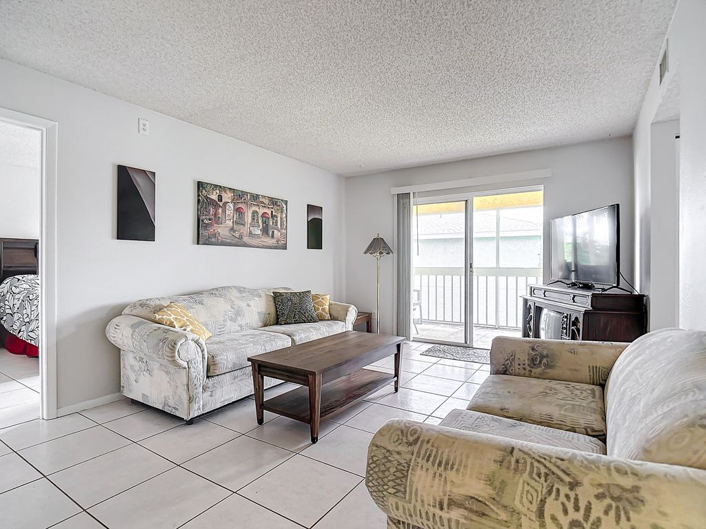 Photo of 939 Sonesta Ave Avenue NE #204, Palm Bay, FL 32905 (MLS # RX-11127022)