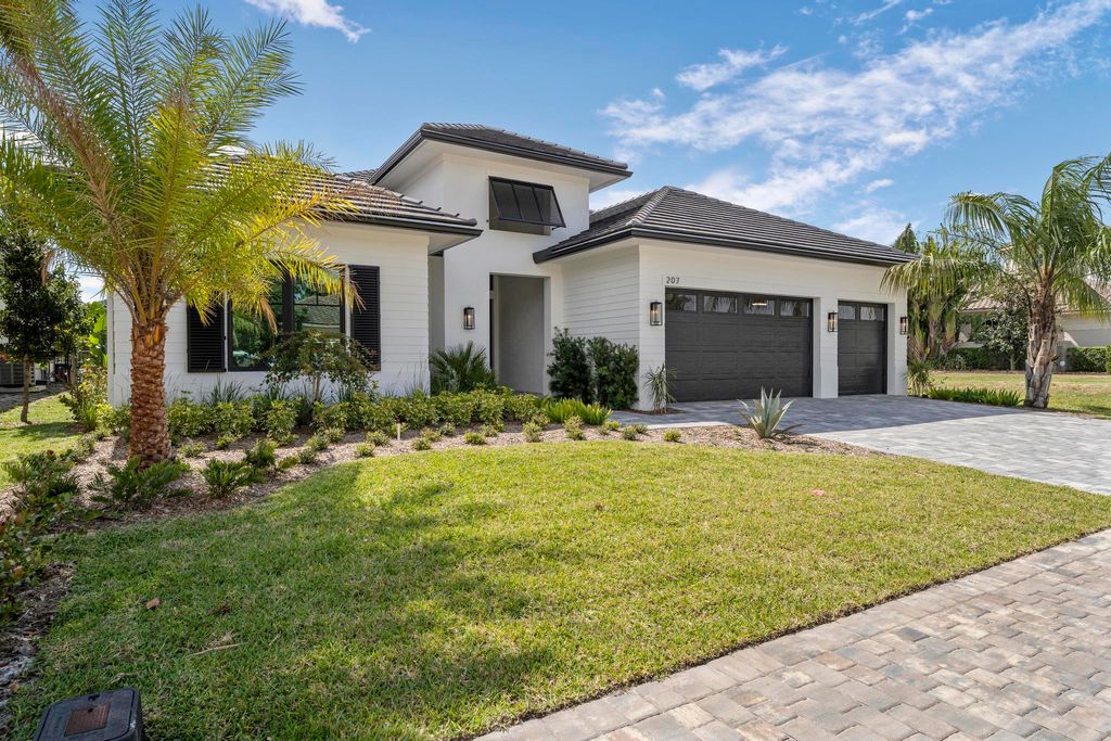 Photo of 207 SE Bella Strano, Port Saint Lucie, FL 34984 (MLS # RX-11075176)