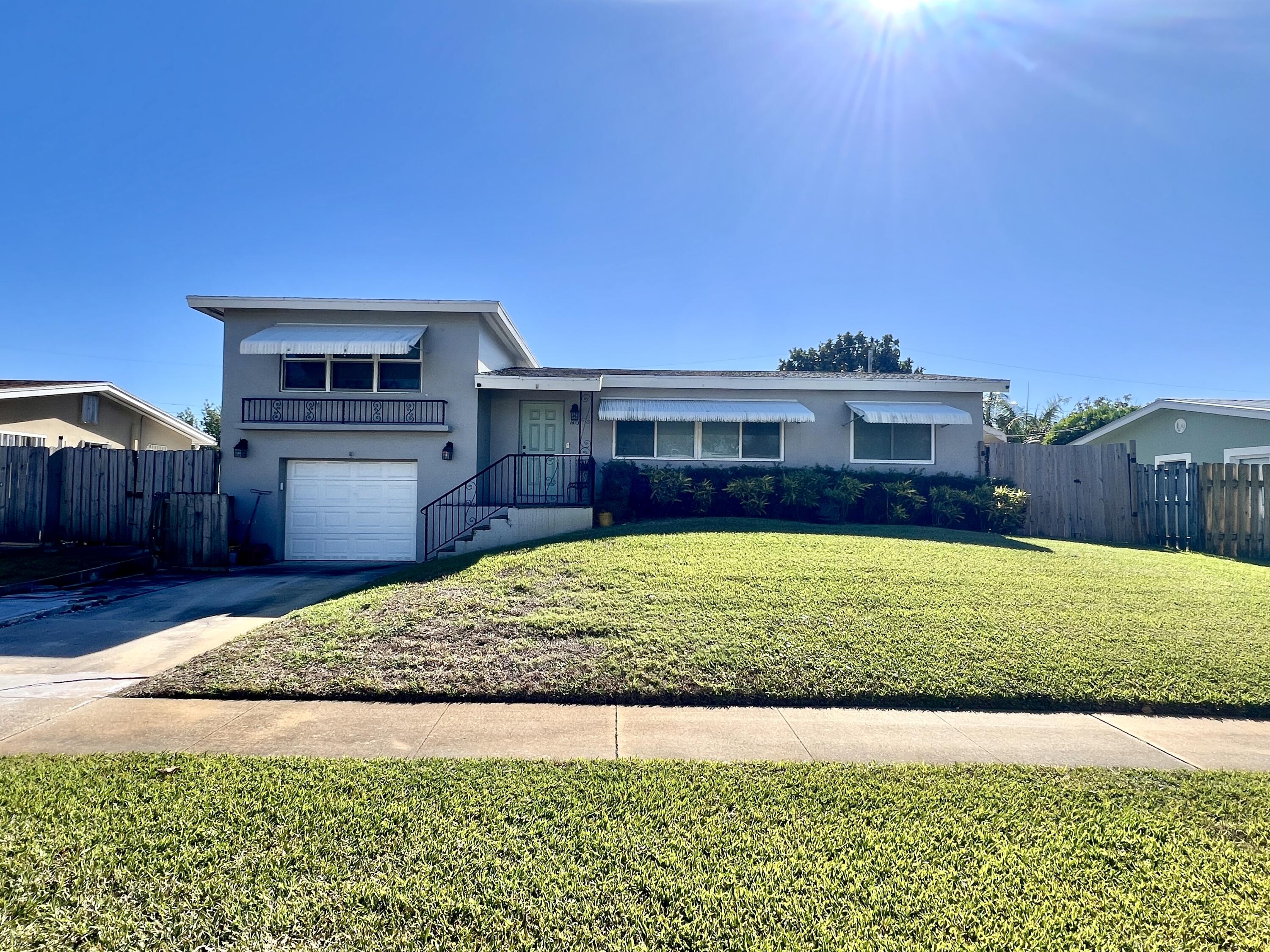 1413 Ontario Drive, Lake Worth, Palm Beach County, Florida - 4 Bedrooms  
2 Bathrooms - 