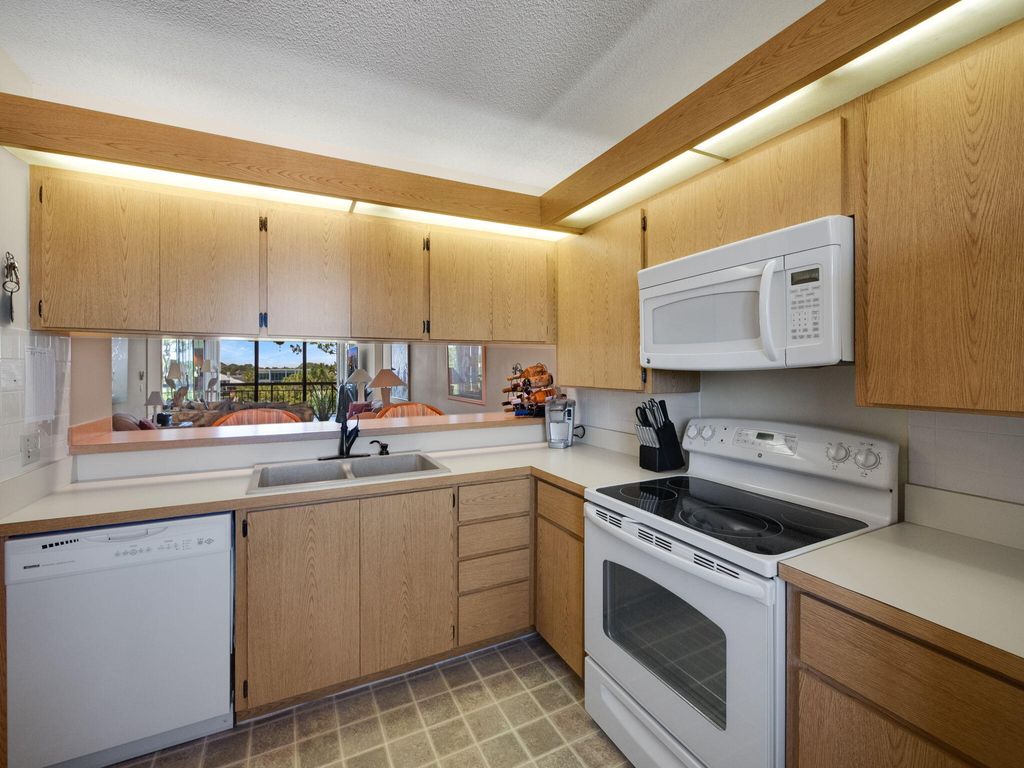 Photo of 1901 Marina Isle Way #403, Jupiter, FL 33477 (MLS # RX-11125472)