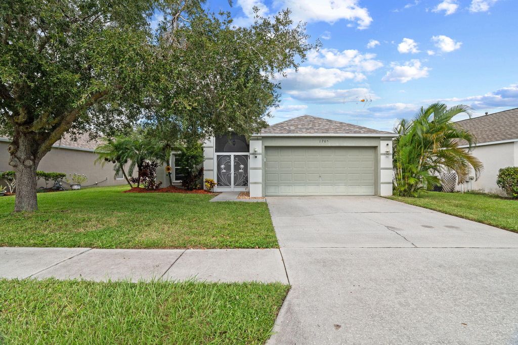Photo of 1705 Las Palmos Drive, Palm Bay, FL 32908 (MLS # RX-11126290)