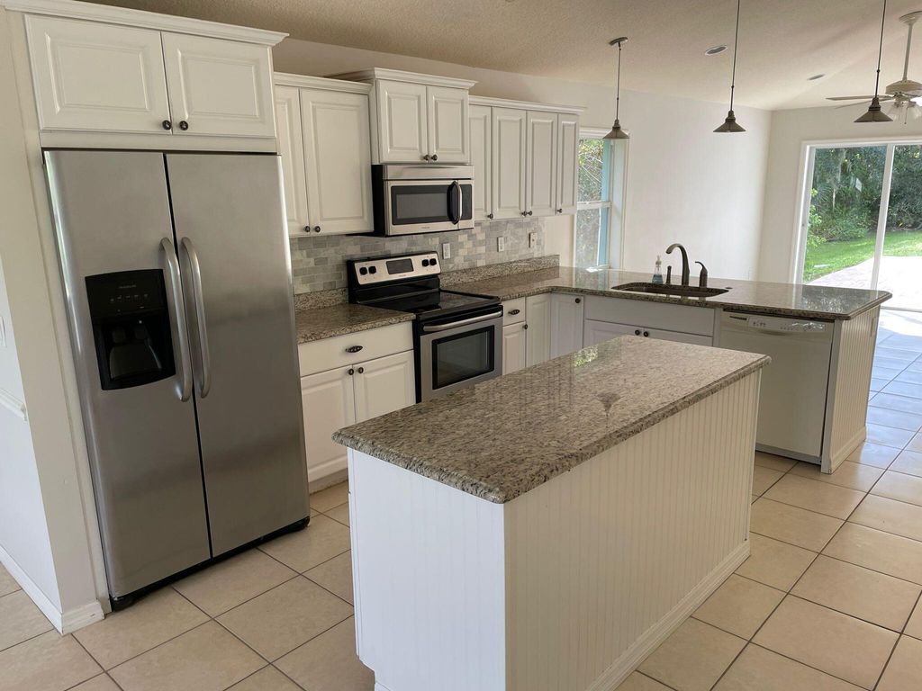 Photo of 778 SW 33rd Street, Palm City, FL 34990 (MLS # RX-11031856)