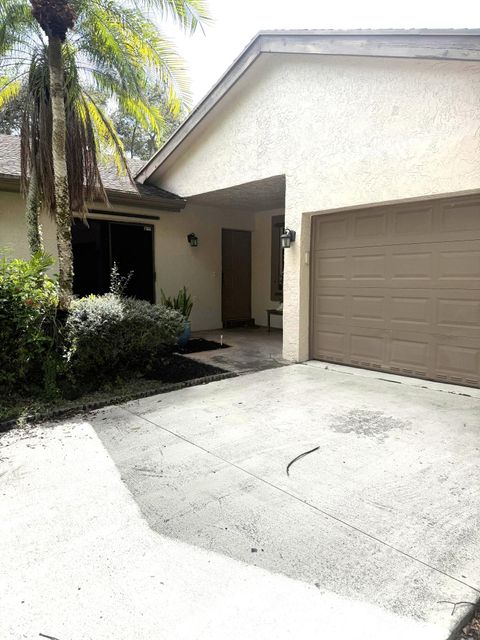 Photo of 2216 Seagrape Circle, Coconut Creek, FL 33066 (MLS # RX-11129519)