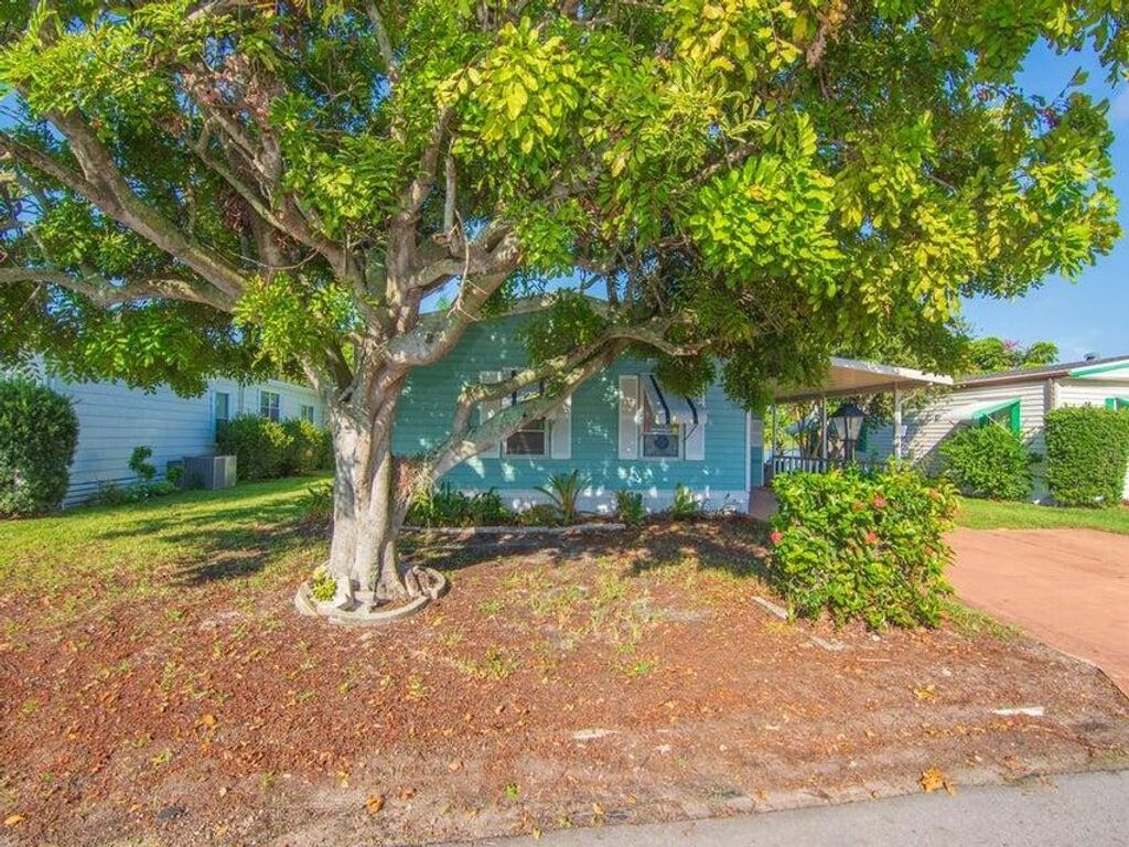 Photo of 6910 SE Morningside Drive, Stuart, FL 34997 (MLS # RX-11110143)