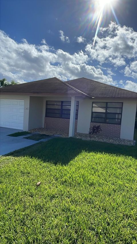 Photo of 1380 Longarzo Place, West Palm Beach, FL 33415 (MLS # RX-11127360)