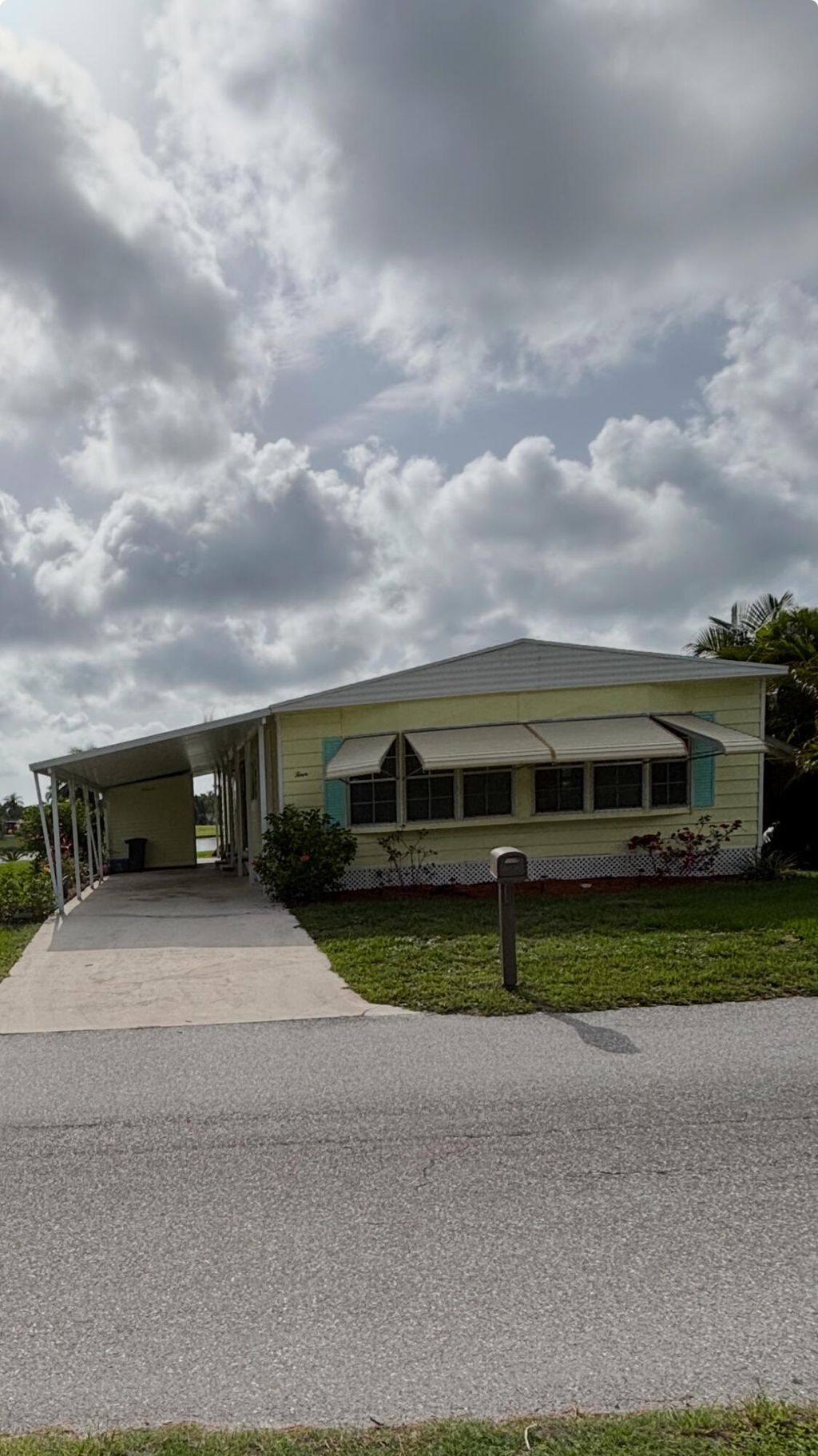 Photo of 4 E Caribbean, Port Saint Lucie, FL 34952 (MLS # RX-11097783)