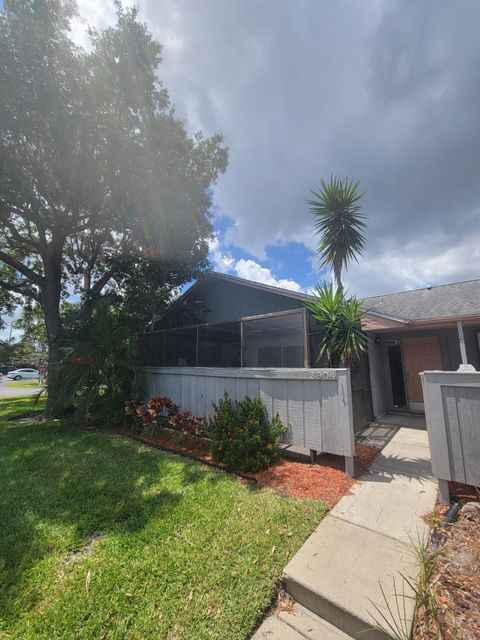 Photo of 3904 NW Cinnamon Tree Circle, Jensen Beach, FL 34957 (MLS # RX-11109980)