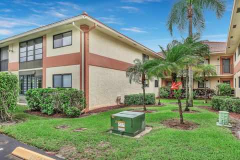 Photo of 15234 Lakes Of Delray Boulevard #244, Delray Beach, FL 33484 (MLS # RX-11129612)