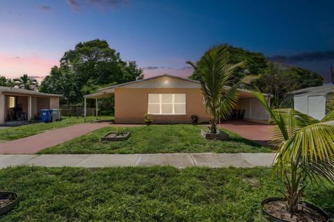 Photo of 1865 NW 6th Avenue, Pompano Beach, FL 33060 (MLS # RX-11125808)