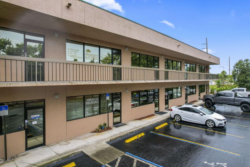 Photo of 725 SE Port Saint Lucie Boulevard #102, Port Saint Lucie, FL 34984 (MLS # RX-10923305)