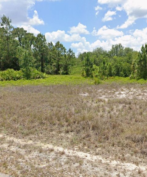 Photo of 1909 Monroe Avenue, Lehigh Acres, FL 33972 (MLS # RX-11129074)